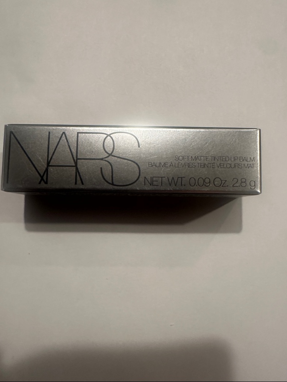 NARS Soft Matte Tinted Lip Balm - Metallic Silver Packaging-Brief Encounter